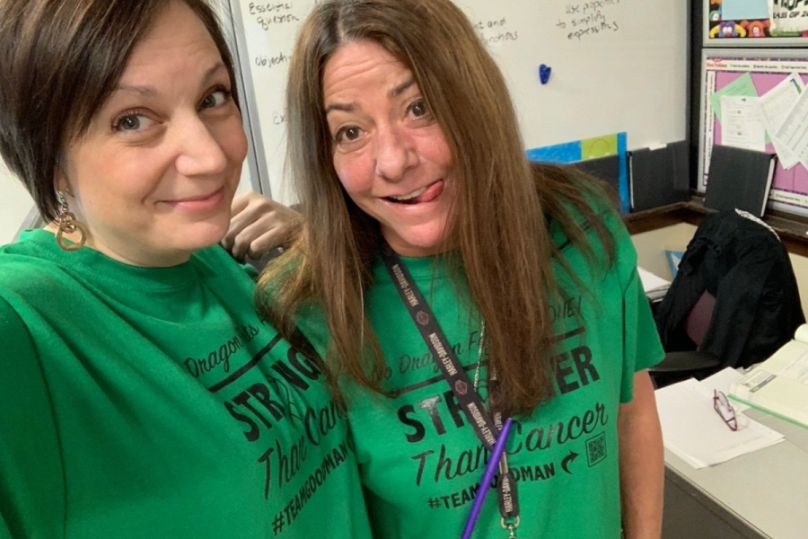 Ms. Goodman and Ms. Britton pose in their shirts.