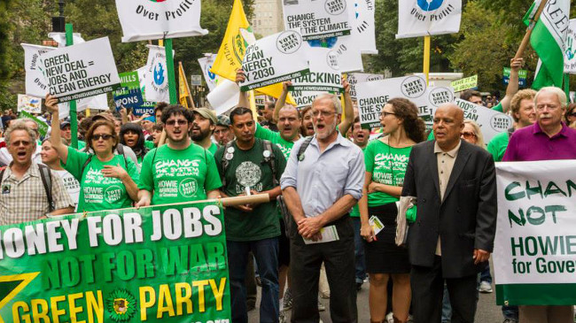 A photograph of Green Party candidate Howie Hawkins speaking at a Green Party Rally - From ProCon.org