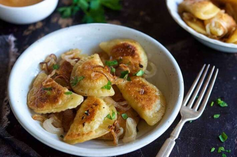 In Poland, stuffed dumplings are called pierogies whereas in Russia and Romania, they are called varenikis. (King Arthur Baking Company)

