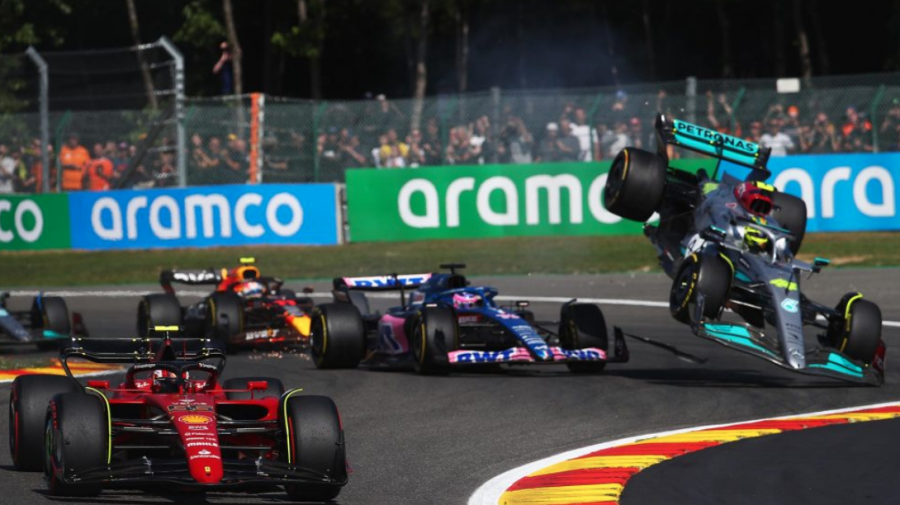Fernando Alonso shoves Lewis Hamilton off of the track in the 2022 Belgian Grand Prix. Credit: Formula1.com