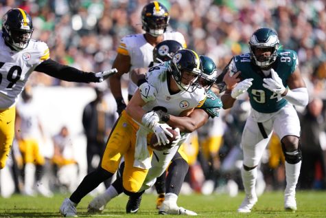 Steelers quarterback Kenny Pickett gets sacked by the Eagles defense in their Week 8 matchup. (Mitchell Leff/Getty Images)