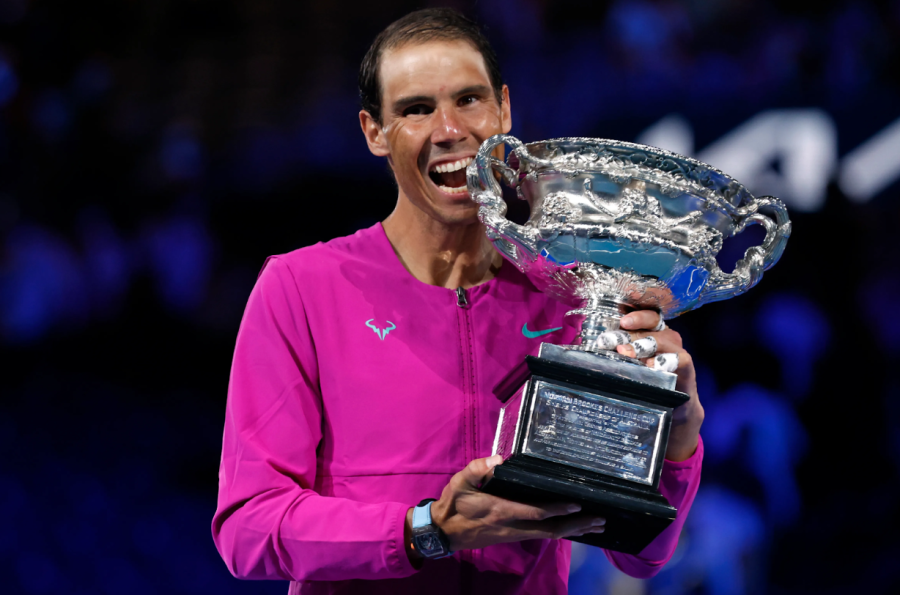 Nadal+lifting+the+Austrailian+Open+trophy+after+defeating+Daniel+Medvedev+in+the+2022+Austrialian+Open+Final.+Photo+Credit%3A+usatoday.com